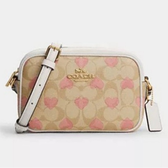 Coach Handbags - NWT Coach Mini Jamie Camera Bag In Signature Canvas With Heart Print CO940